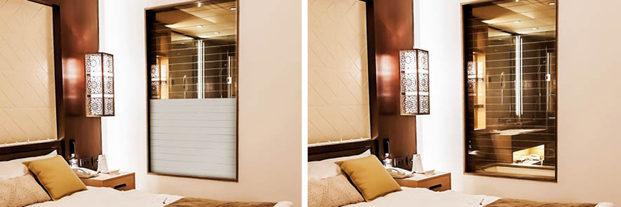 Das schaltbare GMVG Smart Glass von Glas Mayer Ginsheim lässt hier im transparenten Zustand den Blick in das Badezimmer zu, wenn das nicht gewünscht ist, wird die Scheibe einfach blickdicht geschaltet.