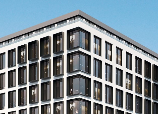 Eines der tonangebendes Elemente in der Aluprof Fassade ist regelmäßig segmentiertes Glas.