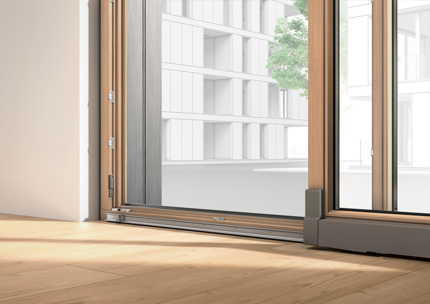 Mit den verdeckt liegenden Kontaktelementen aus dem Programm „Roto E-Tec Control“ werden hohe Sicherheit, Wohnkomfort und verbesserte Energieeffizienz zum Standard. Im Bild eine Schiebetür mit einem aufgeschraubten „MVS B”-Kontaktelement. Beim Öffnen der Tür wird ein Magnetfeld unterbrochen und ein Signal an die Einbruchmeldeanlage abgesetzt.