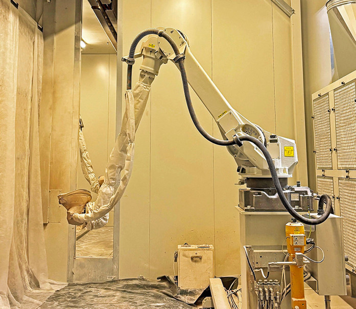 Herzstück der Innovation sind vier Spritzroboter, die die klassische Flutanlage ersetzen.