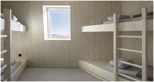Wie das restliche Interieur sind auch die Gästezimmer mit unbehandeltem Fichtenholz vertäfelt und möbliert. Der Blick durch die Velux Fenster lässt die Berglandschaft wie ein Gemälde erscheinen.