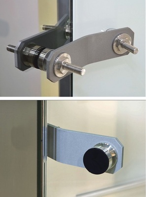 Geklebte Befestigung aus Glas und MetallPunkthalter im Detail. Oben mit der Verschraubung, unten der einseitig angeklebte Halter.