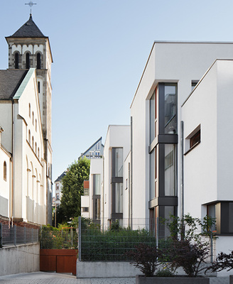 <p>
Die Passivhäuser wurden mit dem Preis „Green Building Frankfurt“ ausgezeichnet. 
</p>