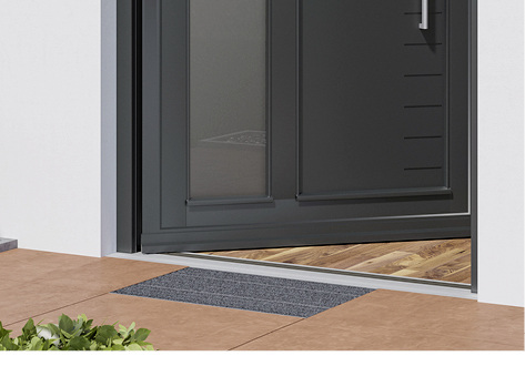 



Der Fertigfußboden außen wird niveaugleich an die Magnet-Nullschwelle und an die Wanne des Fußabstreifers angeschlossen.
