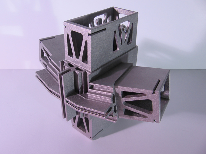 Gedruckter Eckverbinder für Pfosten- und Riegelfassaden aus der Forschungsarbeit von Dr. Holger Strauss in Kooperation mit Alcoa — Kwaneer. - TU Delft