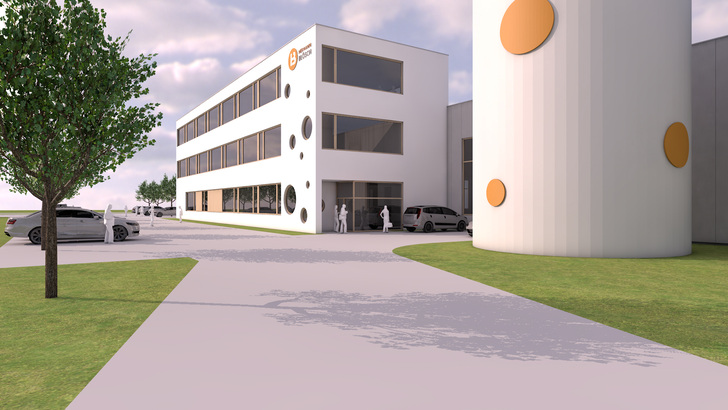 Die i+R Industrie- & Gewerbebau errichtet das moderne Betriebsgebäude in energieeffizienter Bauweise - Visualisierung: Juniwind Architektur.