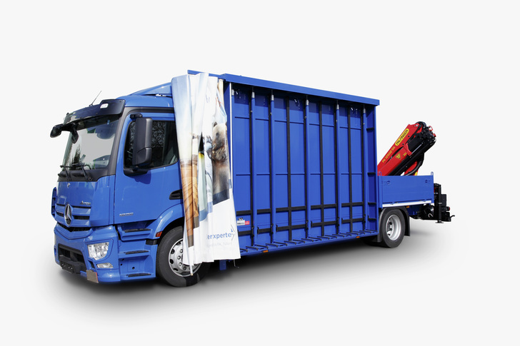 ... eine Plane schützt nicht nur das Glas, sie kann zudem auch als Werbefläche genutzt werden, wie hier bei einem Lkw von Glas Herzog aus Waghäusel. - Hegla