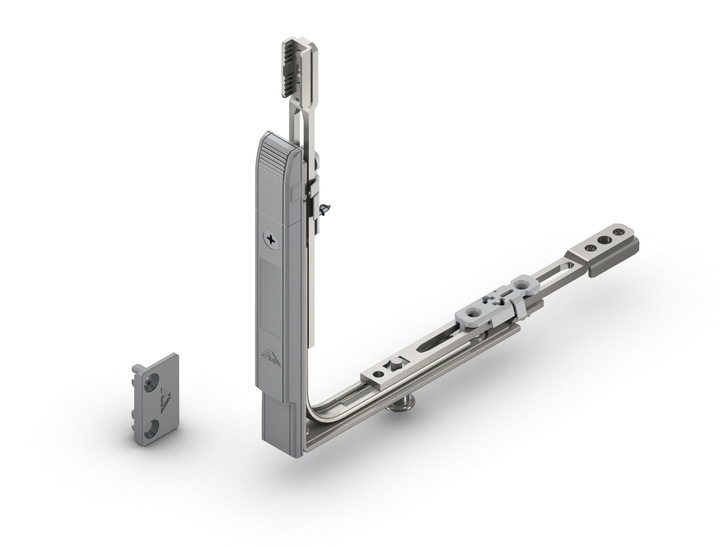 Kennt jeden Zustand: „Roto Com-Tec“ ist ein batteriebetriebener Funksensor (im Bild mit Eckumlenkung) zur sicheren Überwachung eines Fensters. Das Prinzip: den Magneten für die Erkennung der Beschlagposition in die Eckumlenkung einstecken, anschließend den Funksensor einfach anschrauben und den profilspezifischen Magneten (links) am Rahmen befestigen.