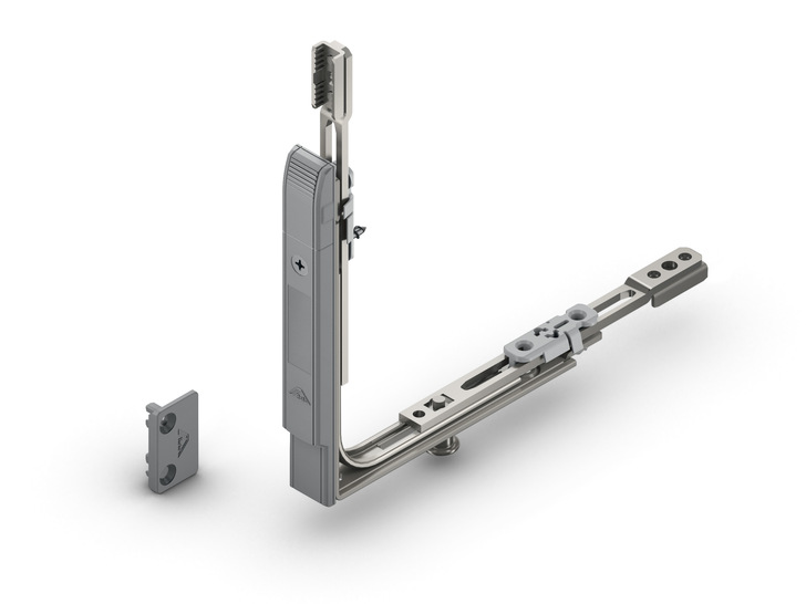 Kennt jeden Zustand: „Roto Com-Tec“ ist ein batteriebetriebener Funksensor (im Bild mit Eckumlenkung) zur sicheren Überwachung eines Fensters. Das Prinzip: den Magneten für die Erkennung der Beschlagposition in die Eckumlenkung einstecken, anschließend den Funksensor einfach anschrauben und den profilspezifischen Magneten (links) am Rahmen befestigen.