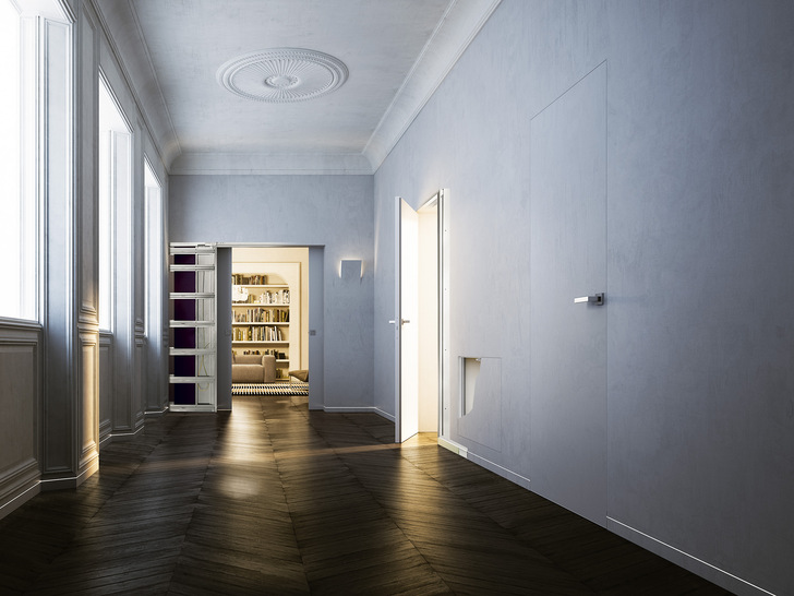 Mit der Syntesis Serie bietet Eclisse ein komplettes Programm zum Thema Wandbündigkeit an: Dieses reicht vom Schiebetürsystem über Drehflügeltüren bis hin zu Sockelleisten, die sich auch beleuchten lassen. - © Foto: Eclisse
