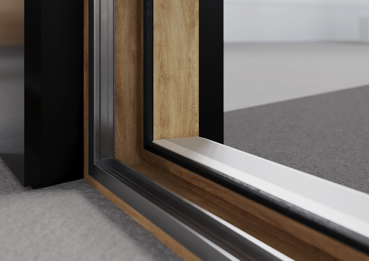 SYNEGO SLIDE ist mit einer pflegeleichten HDF-Oberfläche ausgestattet und bietet über 220 mögliche Varianten an Farbgebung und Oberflächen. Durch Aluminium-Vorsatzschalen der Reihe KALEIDO COVER und einen grauen Grundkörper lässt sich ein eleganter Aluminium-Look erzeugen, der sich mit den Vorteilen und Funktionalitäten polymerer Profile vereint.