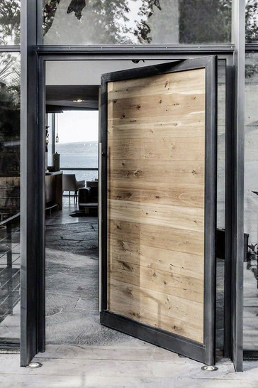 Eine Kombination von Holz und Glas auf eine ­andere Weise, wo das Holz und nicht das Aluminium im Vorder­grund steht.