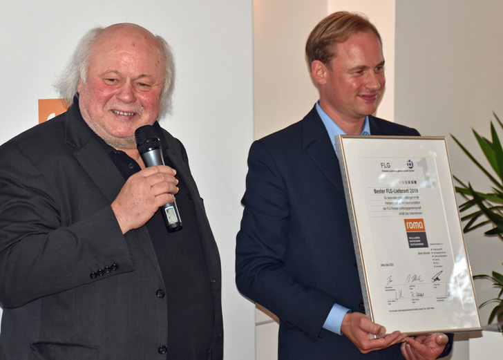 Roland Thoma (l.) und der Laudator Florian Kneer. - © Daniel Mund / GLASWELT
