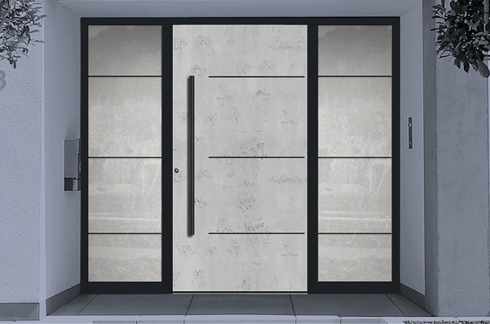 Ein schönes Exemplar: Edles Farbspiel bei Rahmen, Lisenen, ­Rosette und Griff in Tiefschwarz kombiniert mit hochwertiger flügelüberdeckender Füllung in Art-Beton.