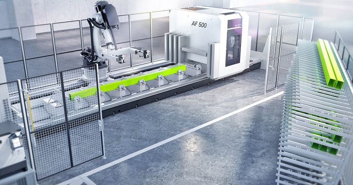 Schüco RX LOAD 500 ist eine Roboterzelle, bestehend aus der Schüco CNC-Maschine AF 500 und einem Roboter mit linearer Verfahreinheit, Sicherheitszaun und mobilem Regal für die Profile
