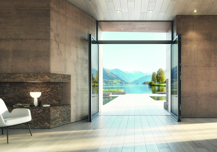 Die neue Schüco Aluminium Stulp-Fenstertür mit Nullschwelle: Der Durchgang von Drinnen nach Draußen wird um den zweiten Fenstertürflügel barrierefrei erweitert.