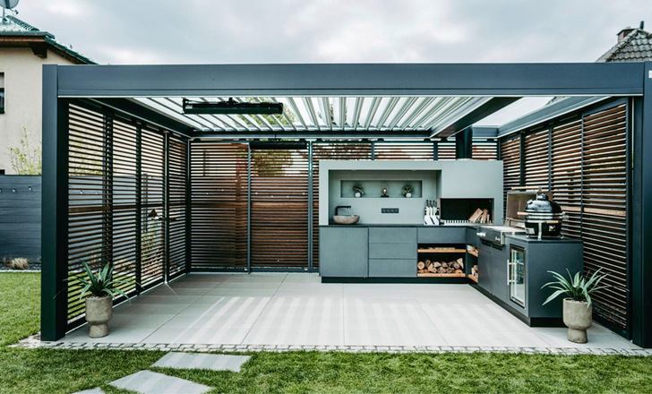 Der integrierte Glasteil von Imago schafft die Möglichkeit, den Abzug der Outdoorküche perfekt zu integrieren.