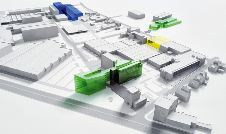 Bau- und Sanierungsmaßnahmen im Überblick: Neubau und bisherige Unternehmenszentrale (grün vorne), neue Bauakustikhalle (gelb), Erweiterung des Zentrallagers (blau), gekaufte Immobilie in der Kammerratsheide (grün hinten). - © Schüco International KG
