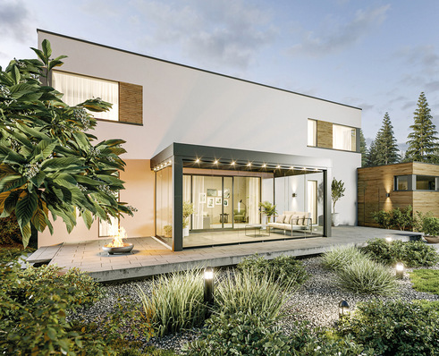 Mit einer Dachneigung von nur 2° und innen liegender Statik entsteht ein nur ­geringes Gefälle, das jedoch Regenwasser gezielt abführt. Weil die Dachfläche ­dezent hinter der 300 mm hohen, umlaufenden Kubus-Verblendung verborgen liegt, ist die Neigung nicht sichtbar.